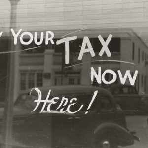 Window display showing "Pay your tax now here!"